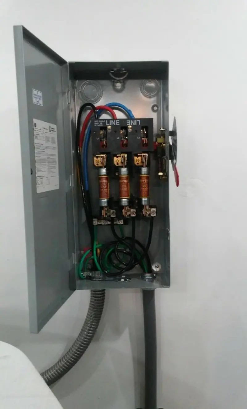 Three-phase disconnect switch installed for Smoke Detector Installation in Fayette