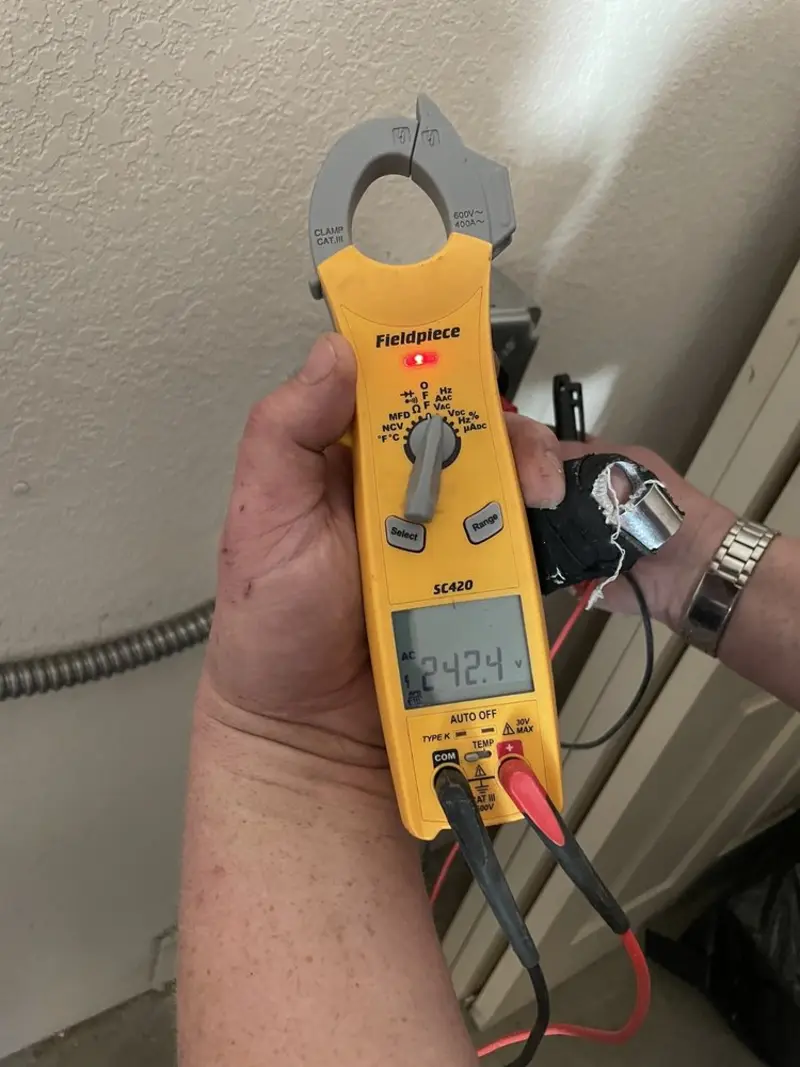 Voltage testing with clamp meter during Generator Installation in Fayette